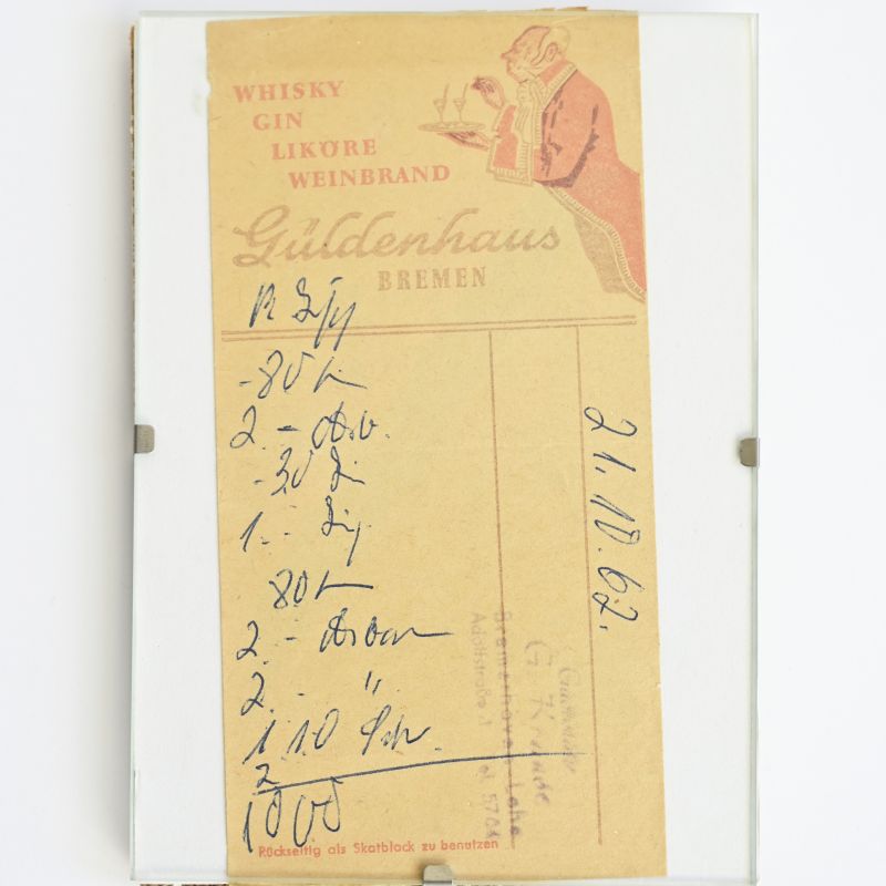 Handgeschriebene Quittung über 10 Mark vom 21.10.1962 in unter einem Glasrahmen.
