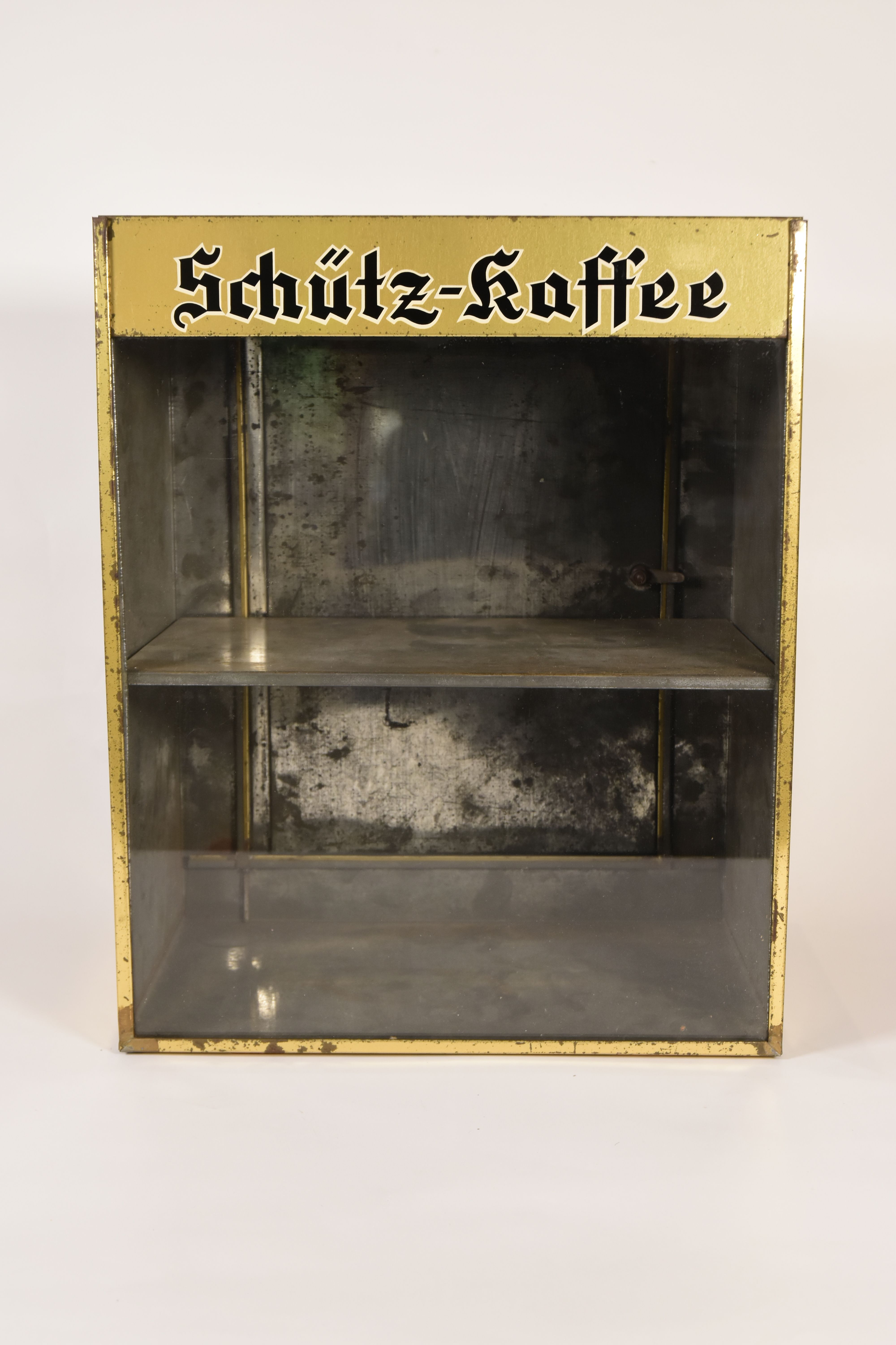 Kaffeedose der Firma Schütz Kaffee mit Schaufenster